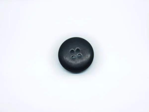 Detailní Záběr Malé Černé Šaty Tlačítko Izolované Bílém Pozadí — Stock fotografie
