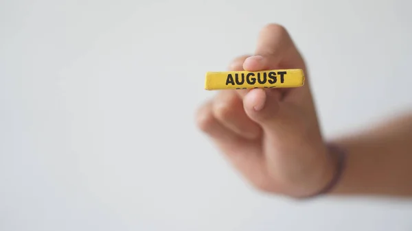 Close Shot Hand Holding Block August Month White Background — Stock Photo, Image