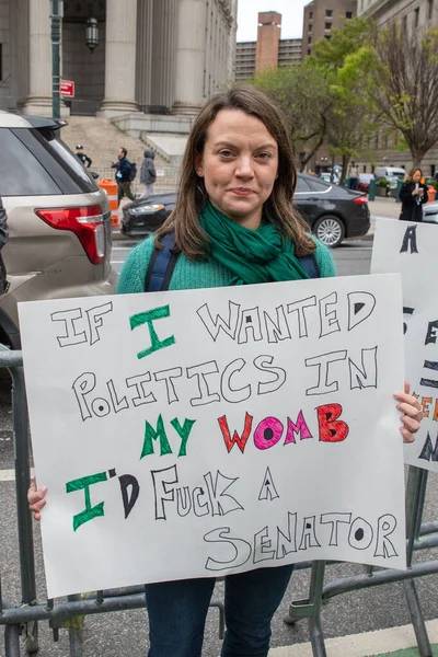 Young Female Holding Cardboard Sign Words Wanted Politics Womb Fuck — Stockfoto