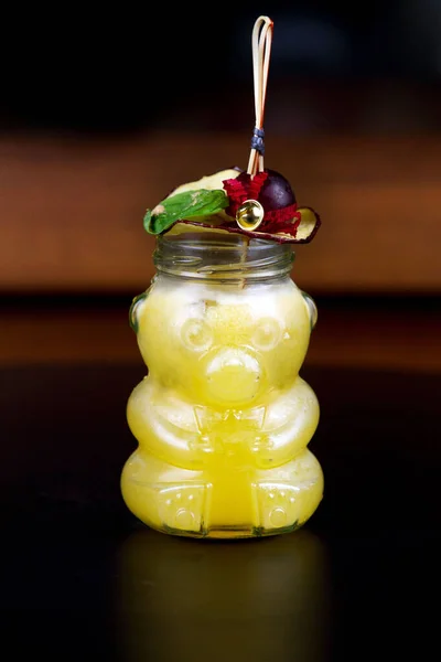 Vertical Shot Yellow Cocktail Bear Shaped Jar — Stock Photo, Image