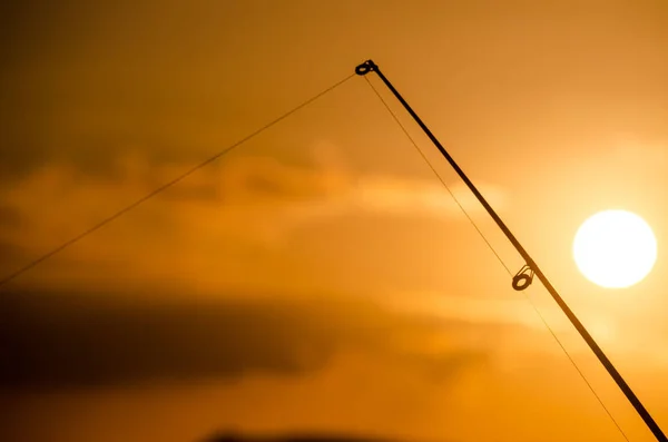 Silueta Caña Pescar Pescador Atardecer Naranja —  Fotos de Stock