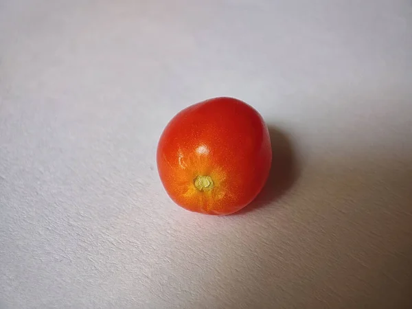 Closeup Shot Red Mini Cherry Tomato White Surface — Stock Photo, Image