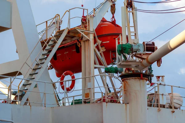 Red Lifeboat Tanker Hanging Air Ship Cloudy Sky Background — Stock Photo, Image