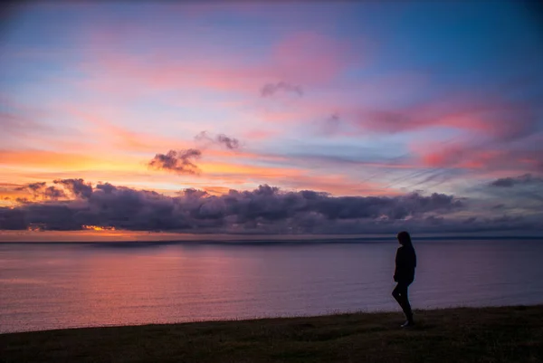 Silhouette Woman Standing Rhossili Bay Beach Sunset Pinkish Sky — Stock Photo, Image