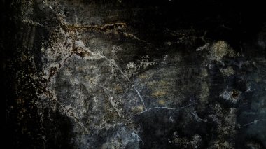 Paslı, eski, kırık bir duvar yüzeyinin yakın çekimi.