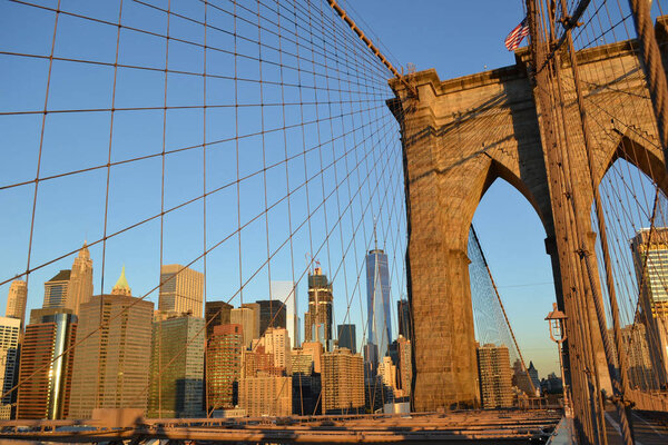 A low-angle view of the Brooklyn Bridge in New York, USA
