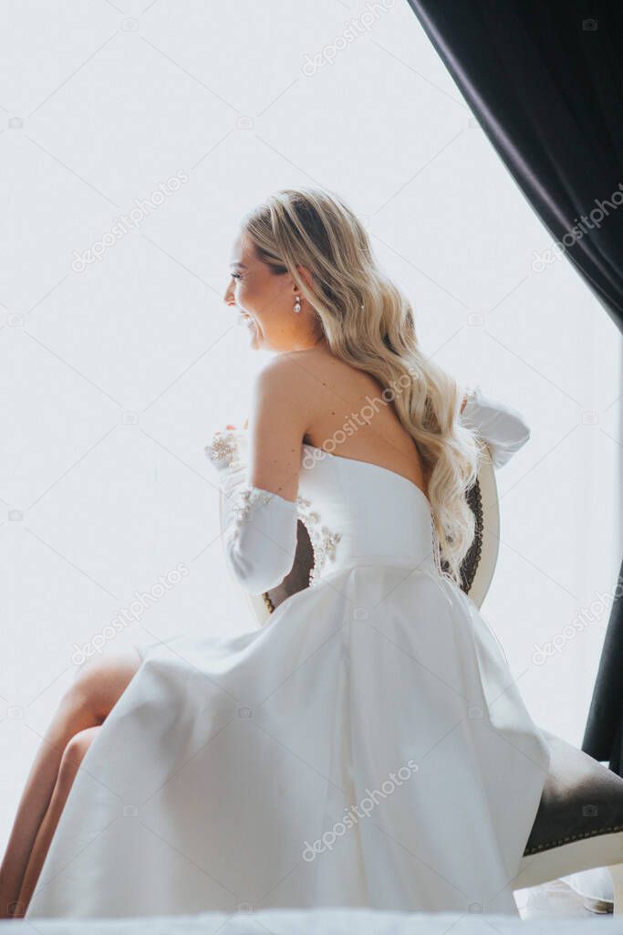 A vertical shot of a Caucasian woman wearing a wedding dress