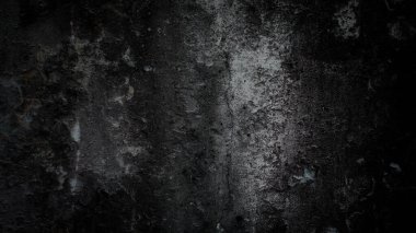 Gri tonlu eski bir duvarın yakın çekimi.