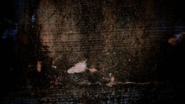 Paslı, eski, kırık bir duvar yüzeyinin yakın çekimi.