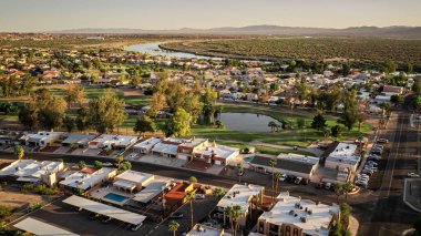An aerial view of Bullhead City with the Colorado River flowing in the background clipart