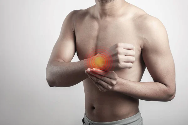 Young Indian Guy Inflamed Wrist Injury Pain Highlighted Glowing Red — Stock Photo, Image