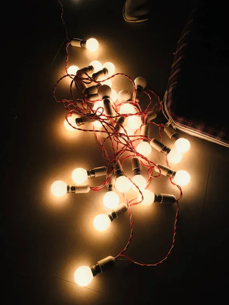 Beautiful Shot Group Lighted Bulbs Connected Together Dark Room — Stock Photo, Image