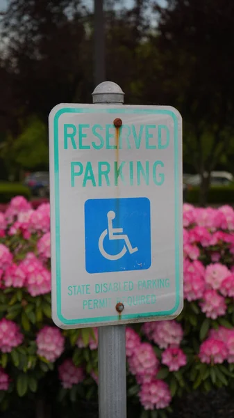 Closeup Disabled Bays Sign Reserved Parking White Metal Column — Stock Photo, Image