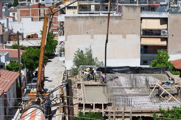 Nşaat Işçileri Inşaat Halindeki Bir Binada Çalışırken — Stok fotoğraf