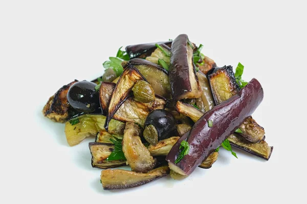 mediterranean italian eggplant dish on white background, concept: vegan nutrition