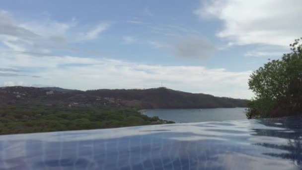 Beautiful View Ocean Surrounded Hills Trees Infinity Pool Playa Hermosa — Stock Video