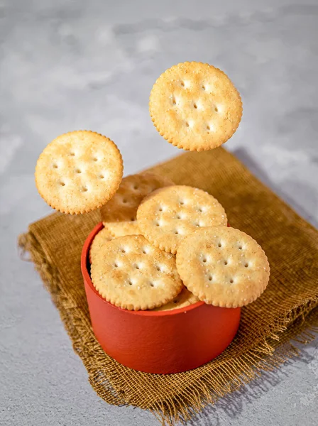 A closeup of delicious salty crackers on a table in a kitchen