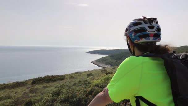 Young Female Caucasian Biker Helmet Admiring View Sea Sunny Day — Stock Video