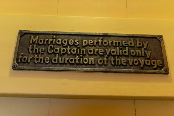 Metal Sign Reads Marriages Performed Captain Valid Only Duration Voyage — 스톡 사진