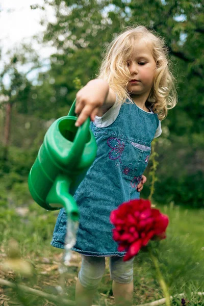 Vertical Shot Cute Little Girl Watering Plants Green Watering Can — Stock Photo, Image