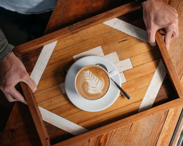 Overhead Shot Male Holding Cappuccino Wooden Table — Stok fotoğraf