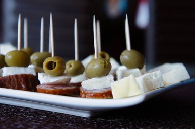 Best appetizer with sausage, olives and cheese