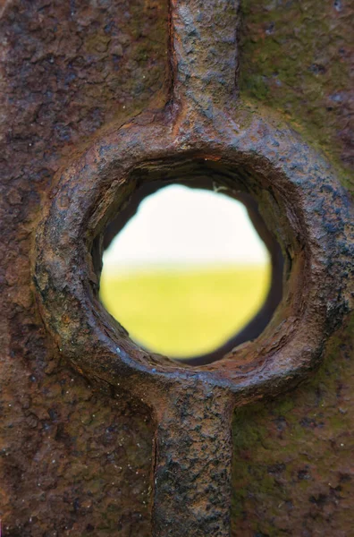 Closeup Rustic Metal Hole Blurry View — Foto de Stock