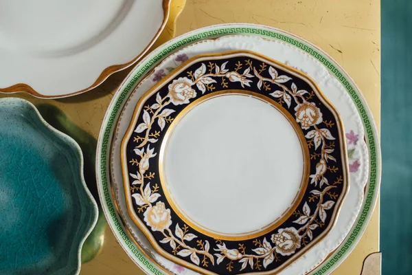 Collection Vintage Plates Gold Green Patterned Dishes Brass Table Teal — Stockfoto