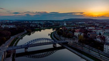 An aerial view of the Vistula River, Krakow, Poland at sunset