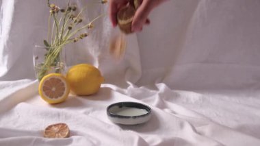 Close up of a snail crawling out of frame leaving a trail of mucin which are used for popular beauty products