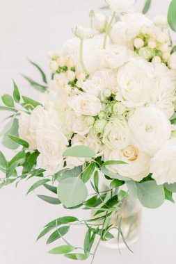 A selective focus shot of a beautiful white wedding bouquet