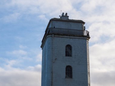 The fish quay high lighthouse on the background of a cloudy sky in Tyne and Wear, England