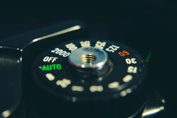 A black camera gear on a blurred background