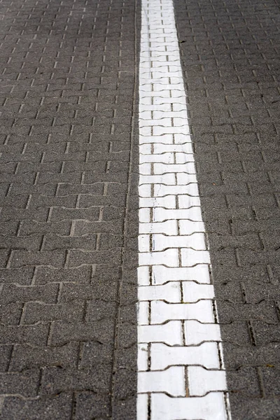 Vertical Shot White Road Marking Cobblestone Path — Stock Photo, Image