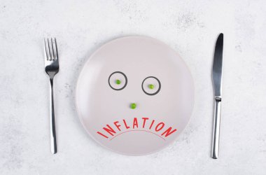 Inflation is standing on the plate, food shortage and starving because of the war ,famine, political issue, face with green peas clipart