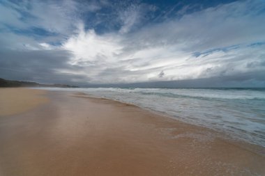 A beautiful shot of the beach of Playa Grande Rio San Juan under cloudy sky, Dominican Republic
