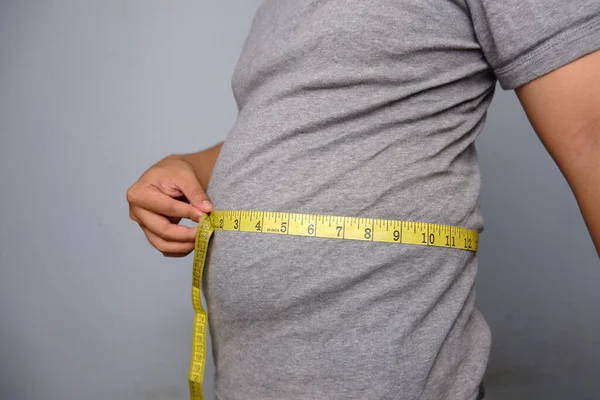 Man Gray Shirt Measuring His Belly Measurement Tape — Stockfoto