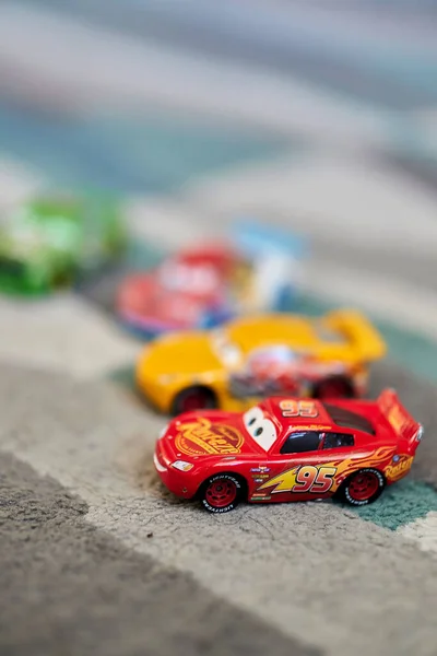 Vertical Shallow Focus Toy Cars Carpet Lightning Mcqueen Cartoon Characters — Stock Photo, Image