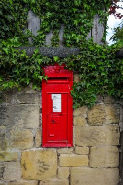 A Victorian era post box on a wall, still in use in Newcastle upon Tyne, UK