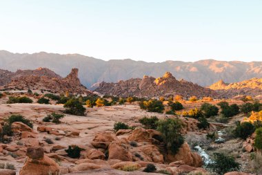 A beautiful shot of the rocky cliffs under a sunny sky in Tafraout, Morocco
