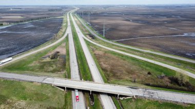 A beautiful view of traffic roads and fields on a sunny day