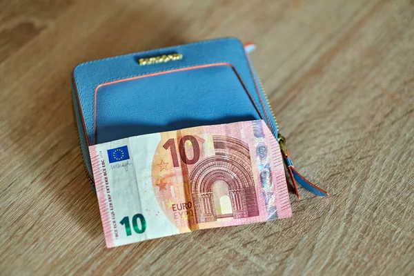 Closeup Shot Blue Samsonite Brand Women Wallet Euro Blurred Wooden — Stock Photo, Image