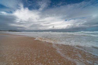 A beautiful shot of the beach of Playa Grande Rio San Juan under cloudy sky, Dominican Republic