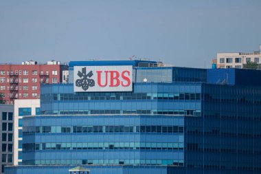 The blue UBS Financial Services building and logo in Weehawken, New Jersey, USA