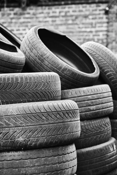 Vertical Grayscale Shot Many Used Old Car Tires Perfect Backgrounds — Fotografia de Stock