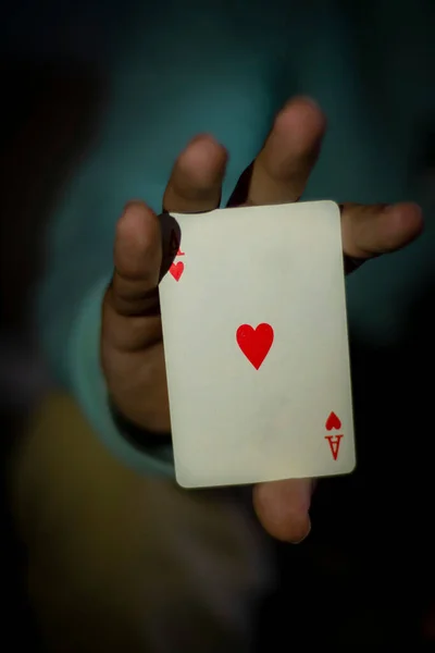 Vertical Shot Hand Showing Hearts Ace Card Blurred Background — Stock Photo, Image