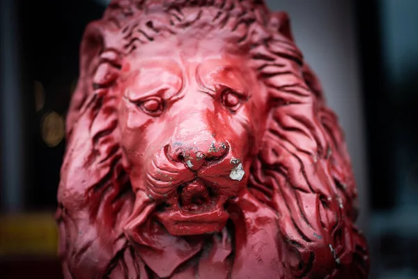 A red lion statue in Dallas, TX