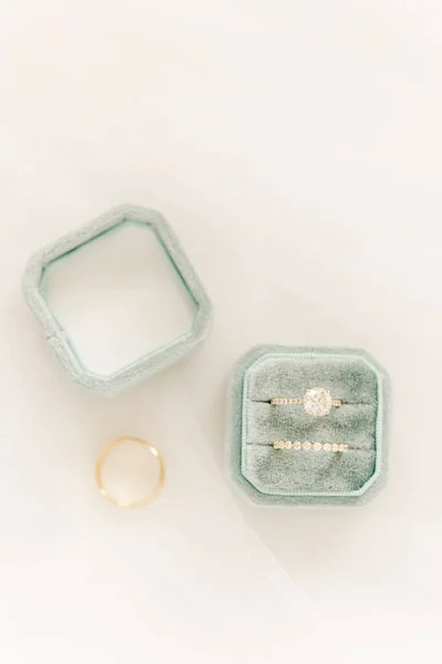 Top View Teal Ring Box Golden Rings White Background — 스톡 사진