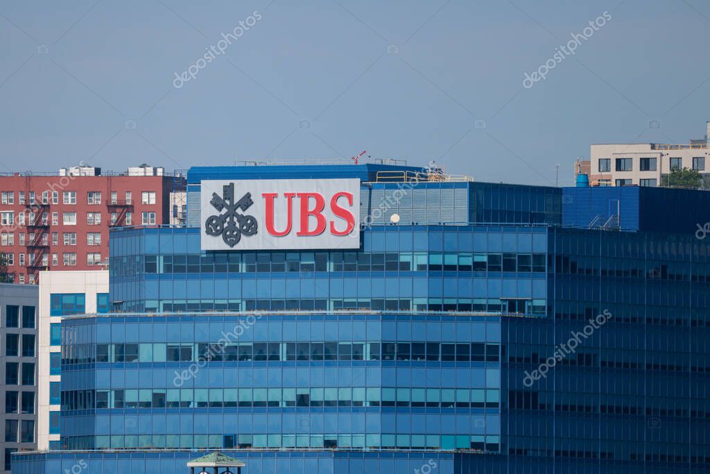 The blue UBS Financial Services building and logo in Weehawken, New Jersey, USA