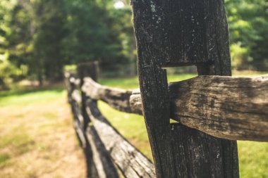 An old wooden fence in a rural field